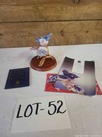 entire lot with figurine, booklet, pamphlet