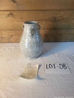 Full view of vase showing color, shape and patterns