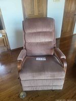 Front view of La-Z-Boy recliner showing upholstery, armrests and overall condition
