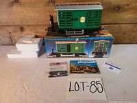 Full lot overview: boxcar on box with inserts and paperwork