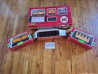 Overview of three boxed LGB items and open track box