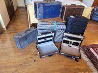Group shot of all seven luggage pieces displaying sizes and colors