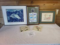 Group shot of all framed pieces and plaques