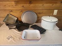 Group shot showing all cookware and bakeware in lot