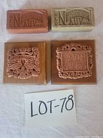 All four plaques grouped with lot number visible