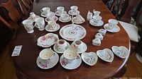 Full lot layout showing all china pieces on table