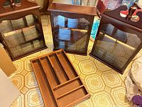 Three cabinets and one shelf insert laid out