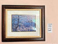 Full view of framed print on wall