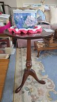 Full view of table with decorative planter on top