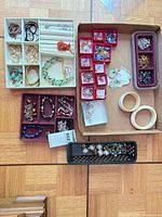 Overview of entire lot showing trays, boxes and various jewelry pieces