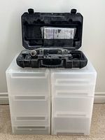 Entire lot: Dremel case on top of two plastic drawer units