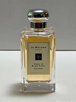 Front view of Jo Malone Peony & Blush Suede Cologne bottle