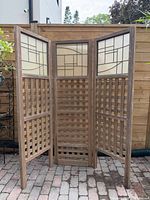 Full view of three-panel wood and plexiglass screen divider