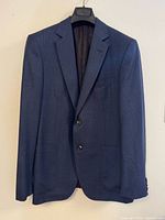 Front view showing overall style, two buttons, pockets