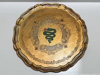 full view of round gilt Florentine tray