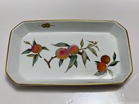 Top view of rectangular Evesham baking dish showing full fruit motif and gold rim