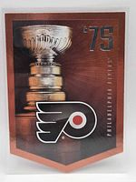 Front of 1975 Flyers trading card showing Stanley Cup and team logo