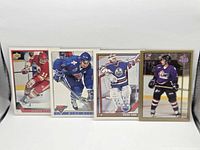 Front view showing all four hockey cards side by side