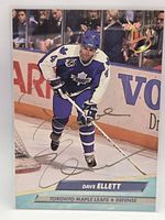 Front of card showing player image, autograph, branding