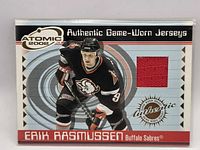 Front of card showing player image, jersey swatch and branding