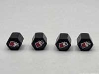 four caps logo side up