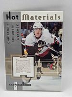 Front of Hot Materials card showing player image and jersey swatch