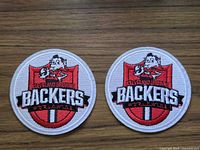 Front view of both identical embroidered patches