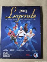 Front cover with title, year and inductee images