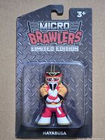 Front of sealed blister card showing figure and branding