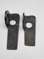 Both brackets front view showing overall shape and finish