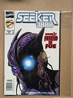 Front cover of Seeker 3000 #2 in bag with board