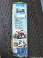 Front of packaged Sunforce solar charger showing product name and applications
