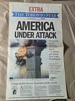 Front page showing headline America Under Attack and Extra banner