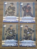Group shot of four Clear Cut Phenoms cards