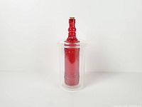 Cooler with sample bottle inserted