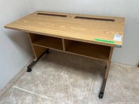 overview of desk showing top, shelves, casters