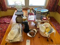 Table overview showing all listed kitchen appliances and tools