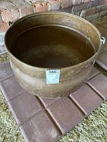Top view of copper cauldron interior and side handles