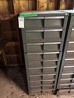 Front view of full-height metal drawer cabinet