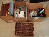 overall lot showing two boxes and wicker tray