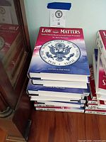 Stack of Law Matters hardcovers with dust jackets