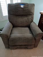 Front view of brown-gray fabric manual recliner