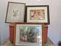 All three framed prints standing together