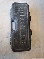Closed black Porter-Cable Tiger Saw hard case