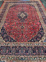 Full view of the entire rug showing pattern, colors, dimensions perspective