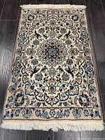 Full view of Naein rug showing entire design and fringe