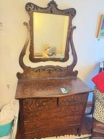 Full view of dresser with attached mirror