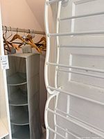 Over-door rack and fabric cubby in closet