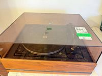 Overall view of Dual 1210 turntable with dust cover closed