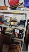 Shelving unit with various listed items